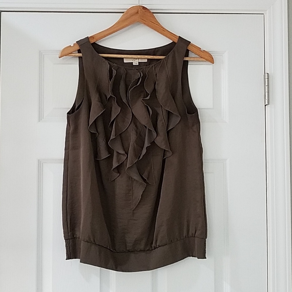 Sleeveless ruffle front top